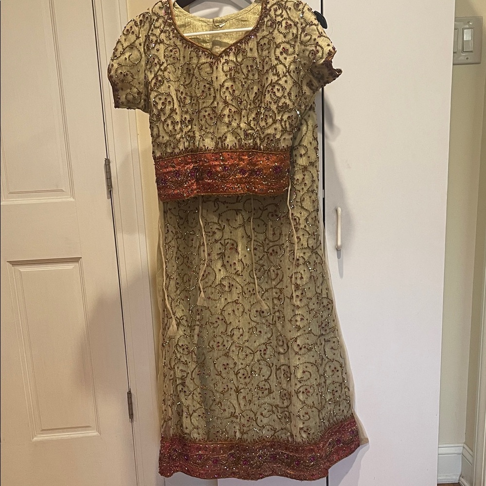Embroidered Dress with Red and Gold Accents